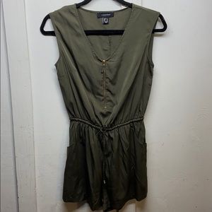 Olive green sleeve less romper has pockets!